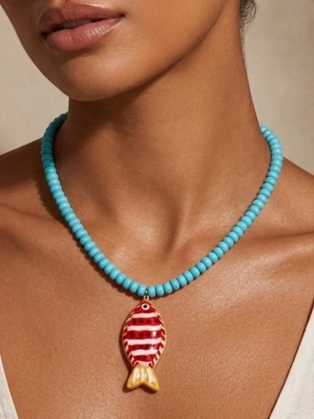 Turquoise Color Beaded Necklace with Red & Gold Fish Pendant